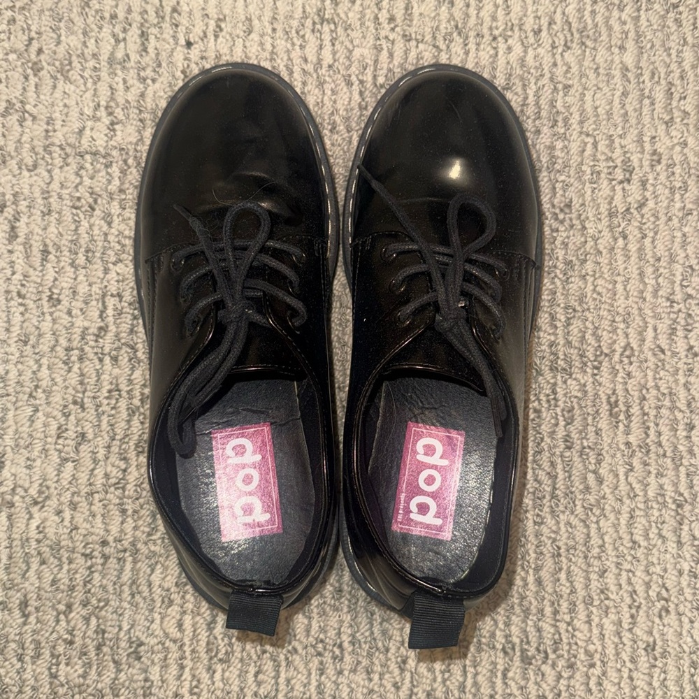 Black leather loafers